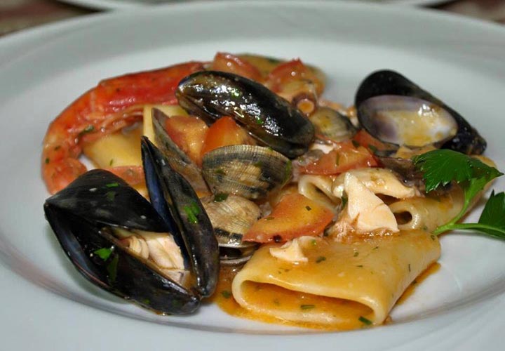 Photo traditional castellanese cuisine Sardinia Sassari